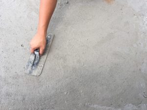 Applying Epoxy Floor Patch to Industrial Flooring